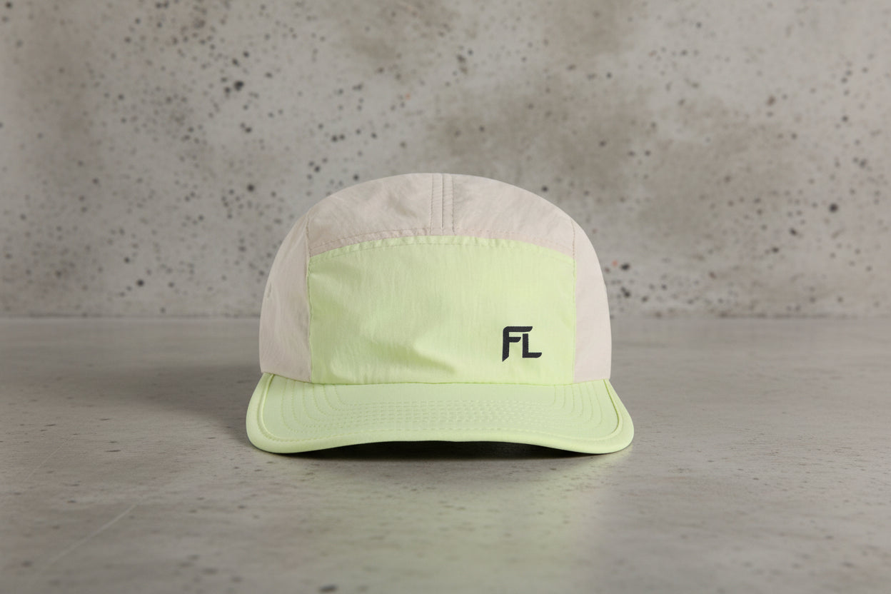 Two-tone cap with a logo on a white background